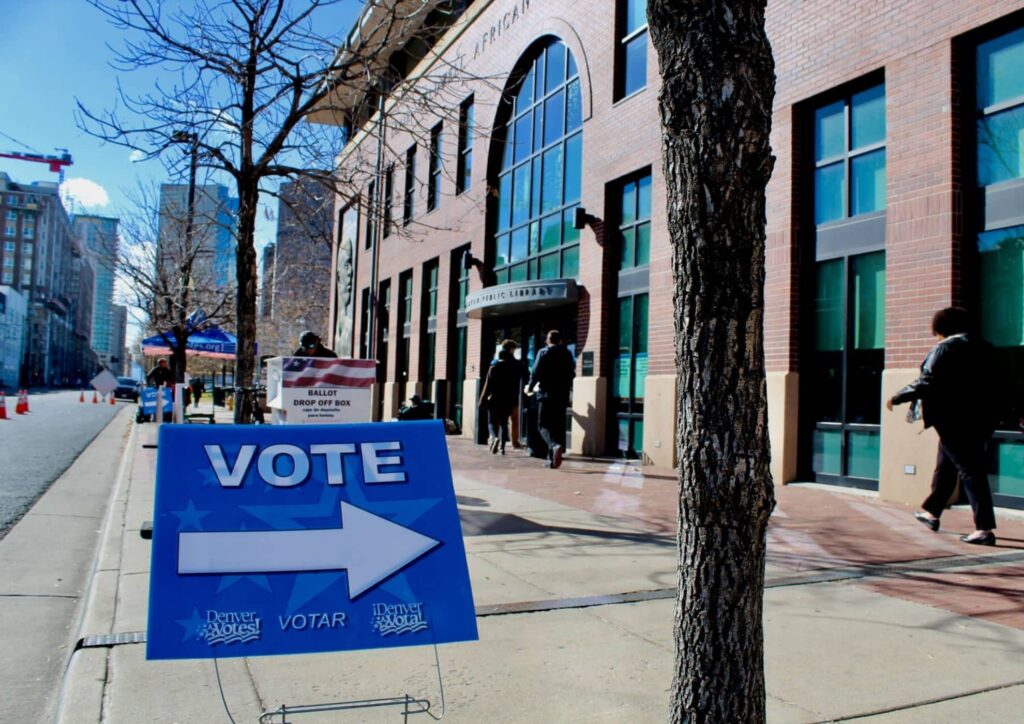 Voters head into a voting center at the Blair-Caldwell African American Research Library in Denver on Election Day in 2018. (Photo by Alex Burness)